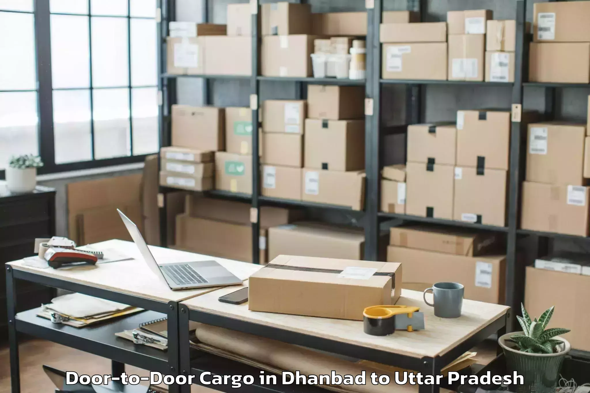 Leading Dhanbad to Jasrana Door To Door Cargo Provider